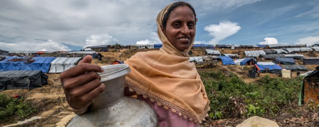 Laila stands near a new Oxfam water pump, Bangladesh. Credit: Tommy Trenchard/Oxfam Laila stands near a new Oxfam water pump, Bangladesh. Credit: Tommy Trenchard/Oxfam