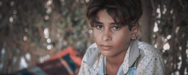 Salah, 11, fled twice during the past four years of war. He witnessed conflict directly and saw people injured and killed. He stopped going to school because he has to work as shepherd or gather plastic to feed his family. Photo: Sami M.Jassar/Oxfam Salah, 11, fled twice during the past four years of war. He witnessed conflict directly and saw people injured and killed. He stopped going to school because he has to work as shepherd or gather plastic to feed his family. Photo: Sami M.Jassar/Oxfam